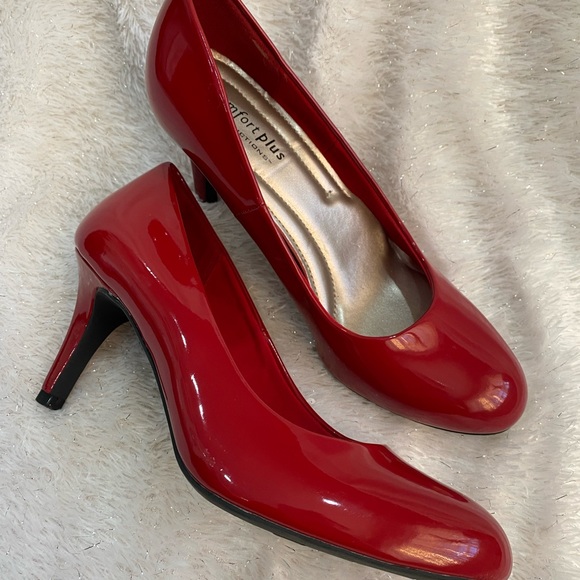 Red patent leather pumps